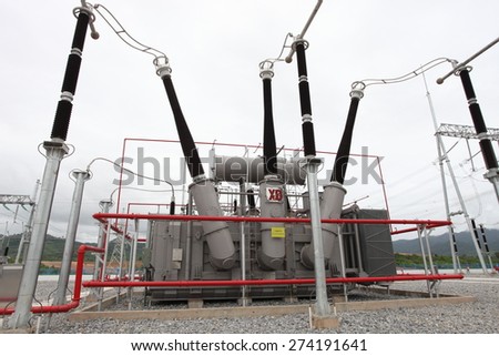 HONGSA - LAO PDR - JULY 23 : Outdoor extra high voltage power switchgear equipment infront of coal fire power plant under-construction on July 23, 2014 in Hongsa District, Lao PDR.