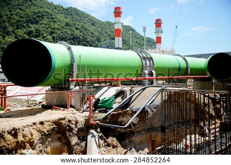 Construction of gas combine cycle power plant with cooling water piping system in Khanorm province, southern region of Thailand.