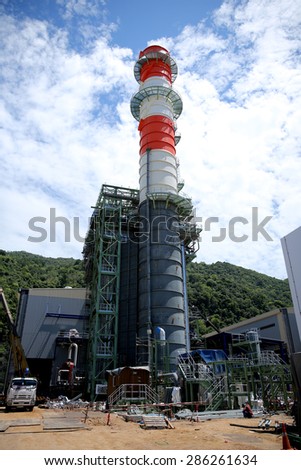 MAY 28, 2015 : KHANORM, THAILAND. Construction of gas combine cycle power plant with cooling water piping system in Khanorm , Nakorn Si Thamarat southern region of Thailand.