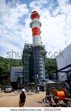 MAY 28, 2015 : KHANORM, THAILAND. Construction of gas combine cycle power plant with cooling water piping system in Khanorm , Nakorn Si Thamarat southern region of Thailand.