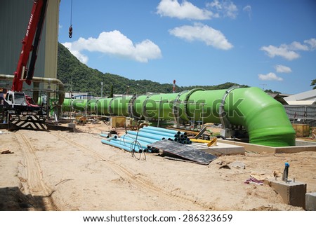 MAY 28, 2015 : KHANORM, THAILAND. Construction of gas combine cycle power plant with cooling water piping system in Khanorm, southern region of Thailand.