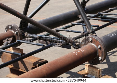 Communication steel piping tower prototype and its assemblies in factory.
