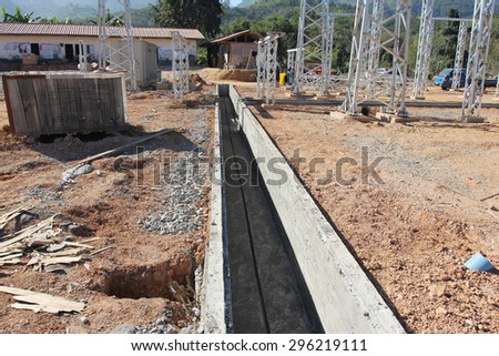 DECEMBER 16, 2012 : LUANG PRABANG - LAO PDR. Under-constructure of civil work and installation of equipment steel supporting  in electrical outdoor switchgear.