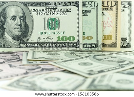 all stack type of american dollars on many dollars background