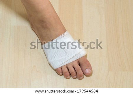 White medicine bandage on injury foot