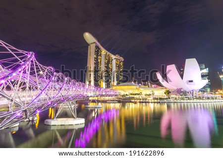 SINGAPORE - JULY 8 : Marina Bay Sands, Lotus Architecture and helix bridge are highlight point on July 8, 2012 in Singapore.