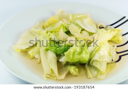 stir-fried cabbage with fish sauce in the plate