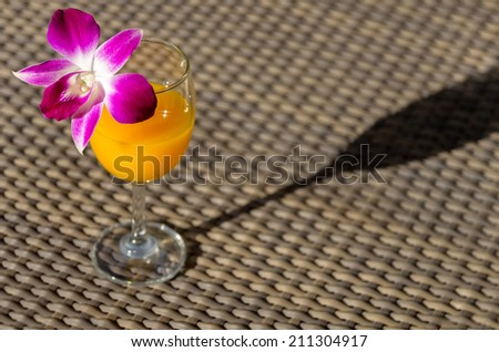 welcome drink orange juice soft drink with shadow and light
