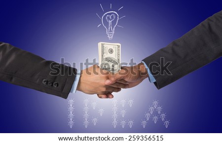Hand shake between a businessman with dollar money for idea of success