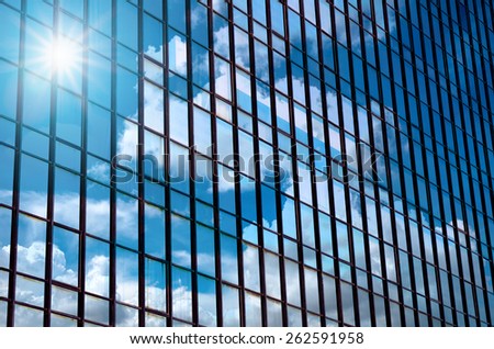 Closeup building glass of skyscrapers with cloud, Business concept of architecture
