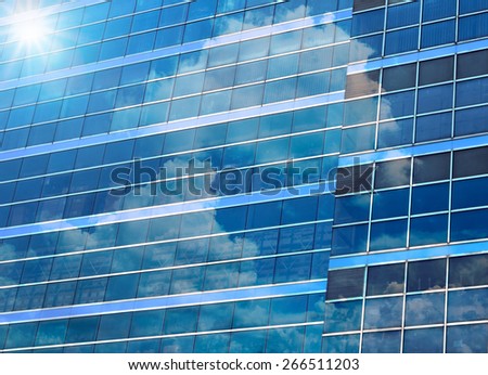 Closeup  building glass of skyscrapers with cloud, Business concept of architecture