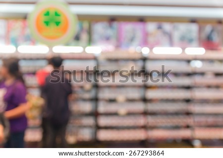 Abstract blurred photo of book store with people background