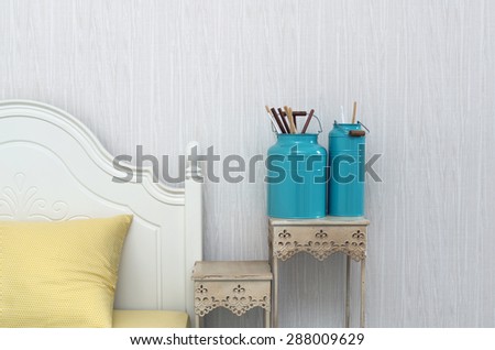 Closeup decorate paint brush in Luxury Interior bedroom