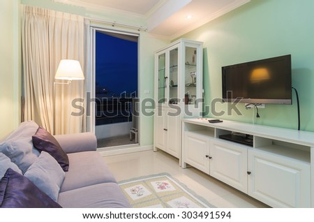 Luxury Interior living room with blue sky at twilight time