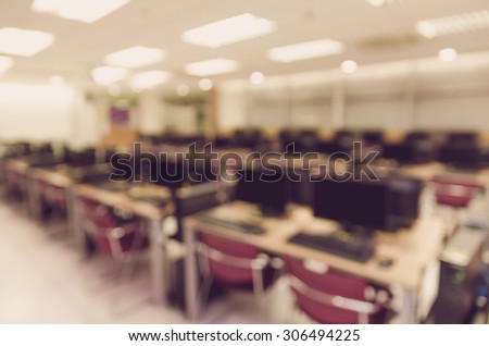 Abstract blurred photo of empty server room, education and business concept