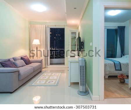 Luxury Interior living room and bedroom with blue sky at twilight time
