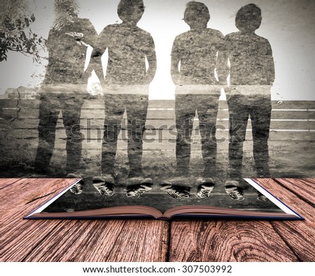 Open book image of Four man reflection in the water after raining