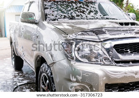 Cleaning the car with foam,car wash shop