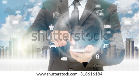 Double exposure of businessman using the smart phone for Information technology on world map and cityscape background, business concept,Elements of this image furnished by NASA