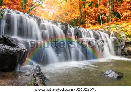 Beautiful waterfall in the forest with rainbow, Sam lan waterfall, Thailand