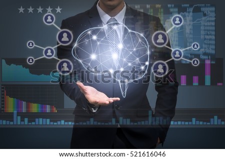 Businessman hand holding the brain over the Technical information over the virtual screen on dark blur background, Business concept, technology and innovation concept