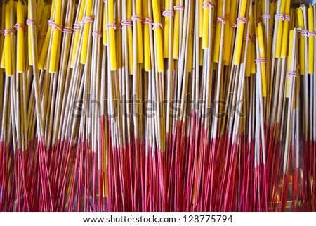 The incense stick for Buddhist pray with Buddha