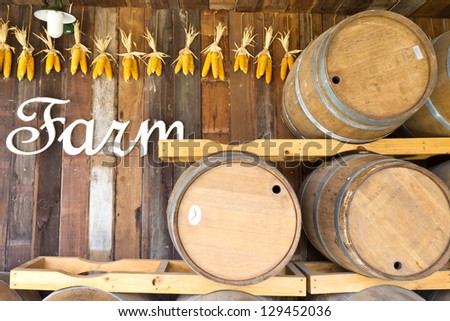 Oak barrels and corns in the farm warehouse