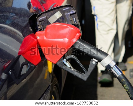 Filling gasoline in to the car