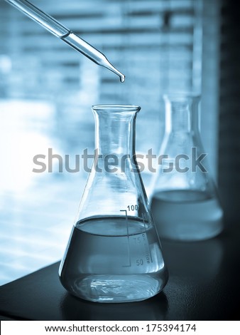 Laboratory glassware with liquid chemical