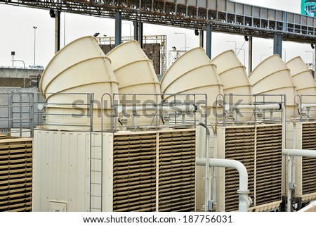 Cooling tower outside factory.