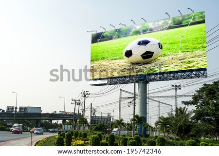 Soccer in the field advertising on bill board