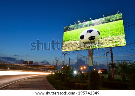 Soccer in the field advertising on bill board