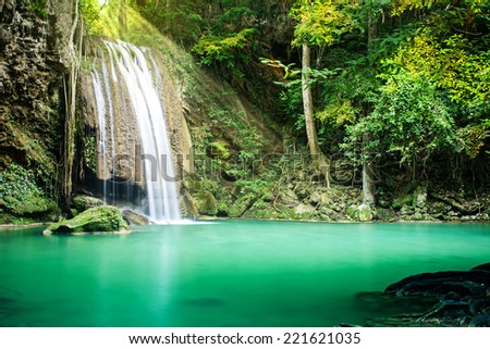Beautiful waterfall in tropical forest, Erawan waterfall, Thailand