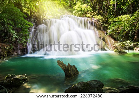 Erawan waterfall in tropical forest, Thailand