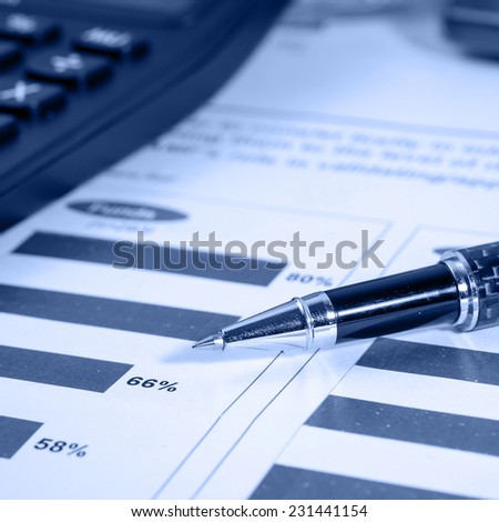 Business financial report with black pen, blue tone