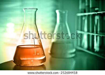 Laboratory glassware containing chemical liquid