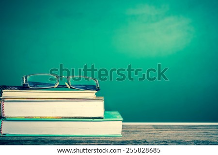 Text book with green board background, vintage tone