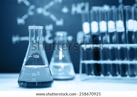 Laboratory glassware containing chemical liquid, Blue tone