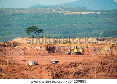 Part of a coal mine pit with big mining Excavator