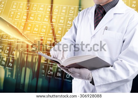 Scientist reading text book with test tubes background