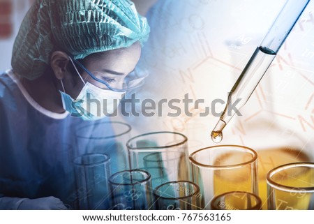 Scientist working in the operating room with dropping chemical liquid to test tube, medical research and development concept