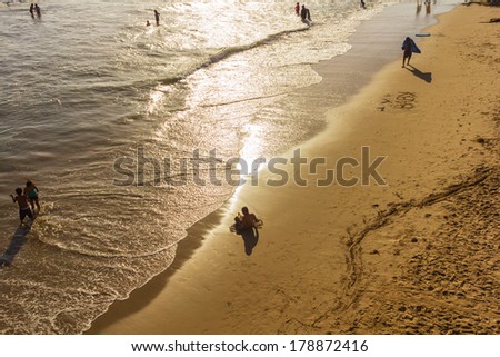 LOS ANGELES, CA -  MAY 27, 2013: Love declaration written on the sand, close to the water line, at dusk, on Santa Monica beach