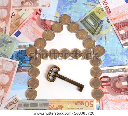 banknotes and coins in house shape with key concept for real state