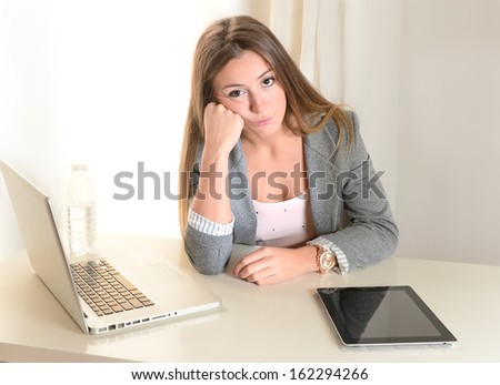 Young Tired Business Woman  frustrated at work