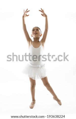 young cute Ballet dancer ballerina dancing wearing a white tutu on a white background