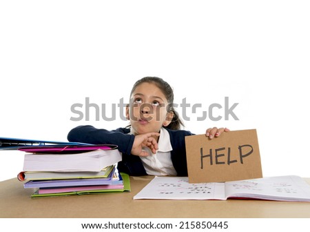 sweet little female latin child studying on desk asking for help in stress with a tired face expression in children education and back to school concept isolated on white background