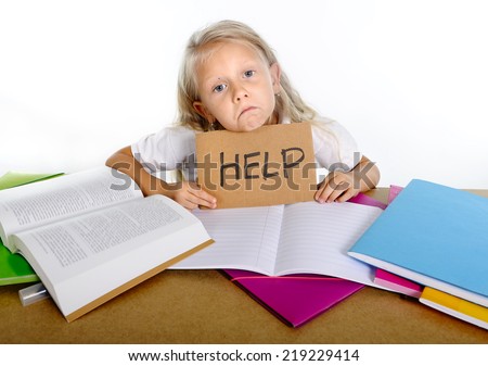 sweet sad and overwhelmed little blonde hair school girl looking bored and tired in stress with books and homework in children education concept isolated on white background