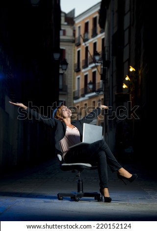 Happy relaxed Business woman office dressed sitting on Chair outdoors on Street with Computer laptop in successful and flexible worker concept on studio lighting