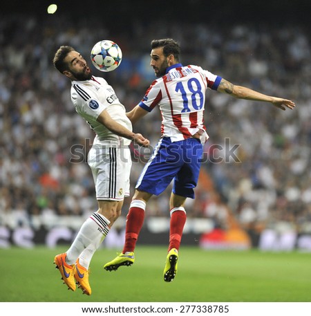 MADRID, SPAIN -  April 22nd, 2014 : CARVAJAL of REAL MADRID and JESUS GOMEZ of ATLETICO DE MADRID during Europe Champions League match at Santiago Bernabeu Stadium