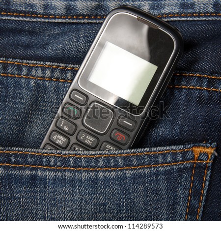 Mobile phone in pocket jeans